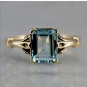 Elegant Gold Band With Blue Square Stone